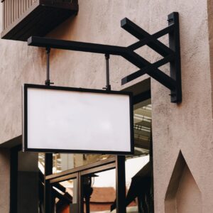 horizontal empty signage on clothes shop front with copy space.